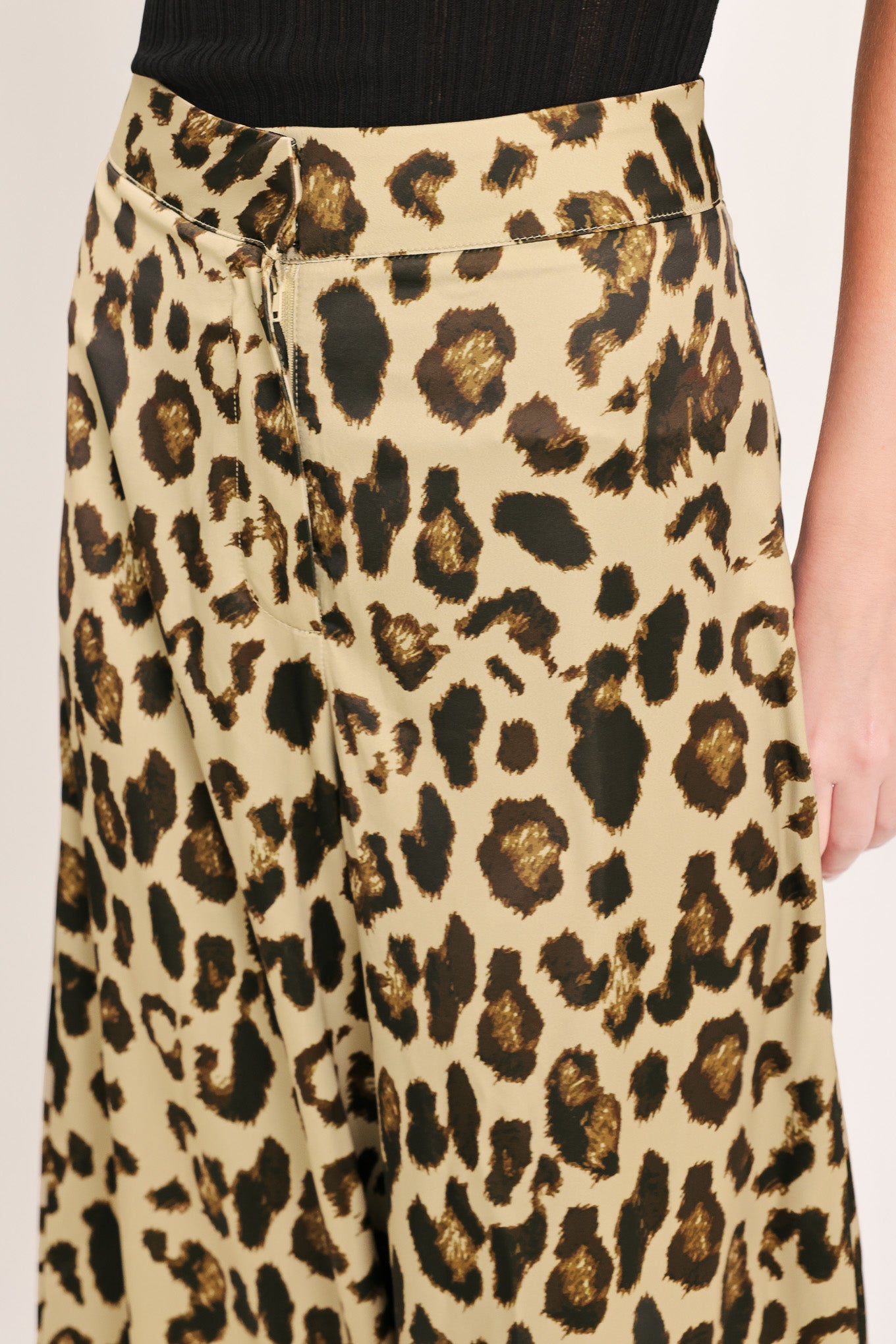 Woman wearing leopard print wide leg pant with front closure | Flying Tomato