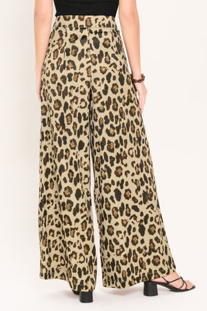 Woman wearing leopard print wide leg pant with front closure | Flying Tomato