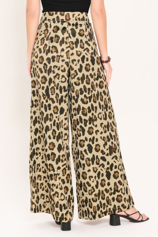 Woman wearing leopard print wide leg pant with front closure | Flying Tomato