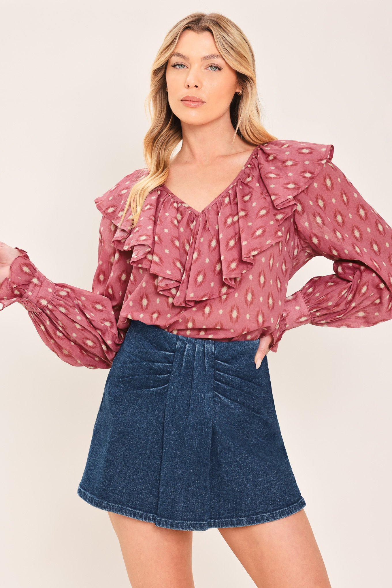 A woman wearing a dark blue denim mini skort | Flying Tomato