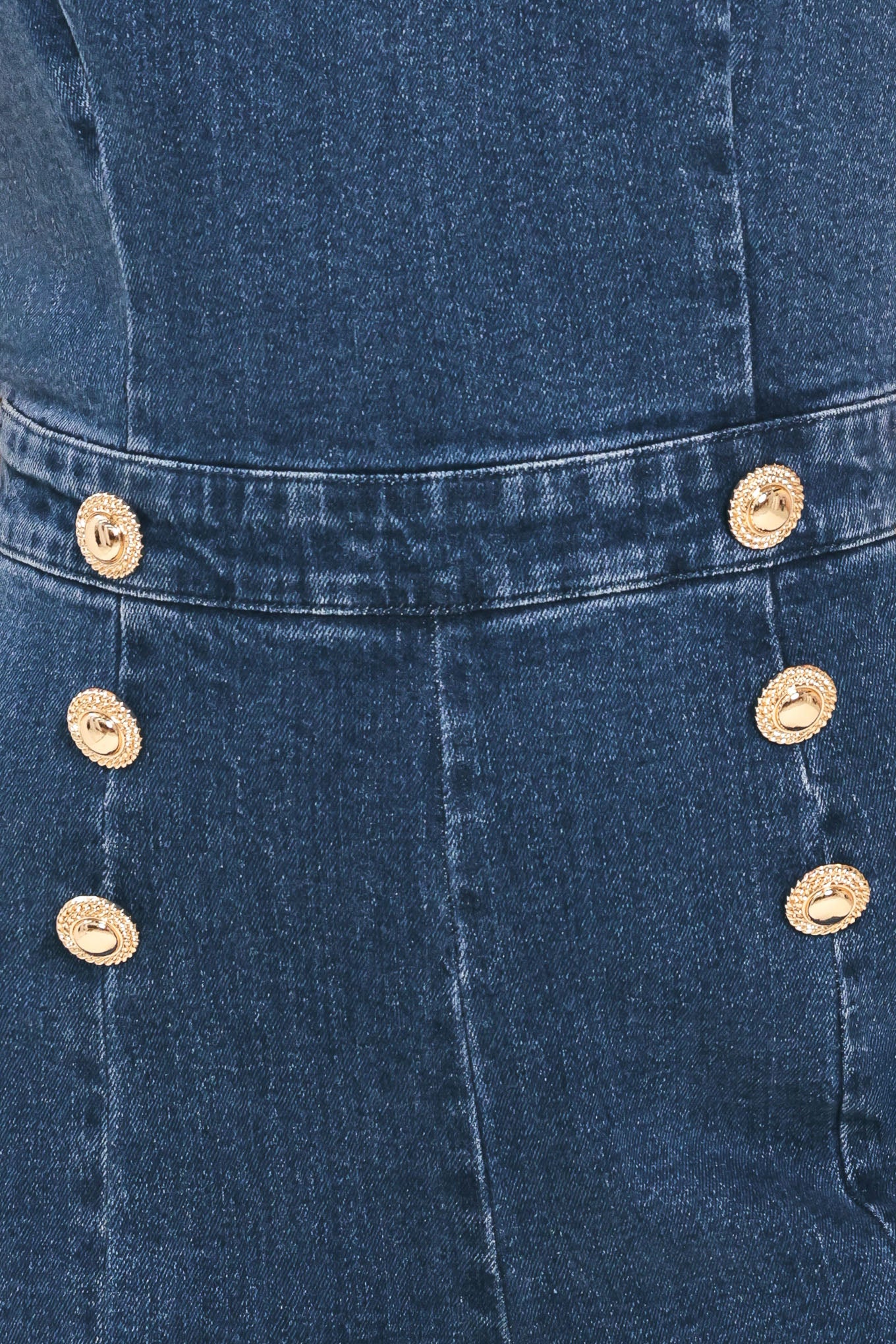 Woman wearing a denim jumpsuit featuring halter neckline, front button detail, wide leg, bare back and zipper closure | Flying Tomato