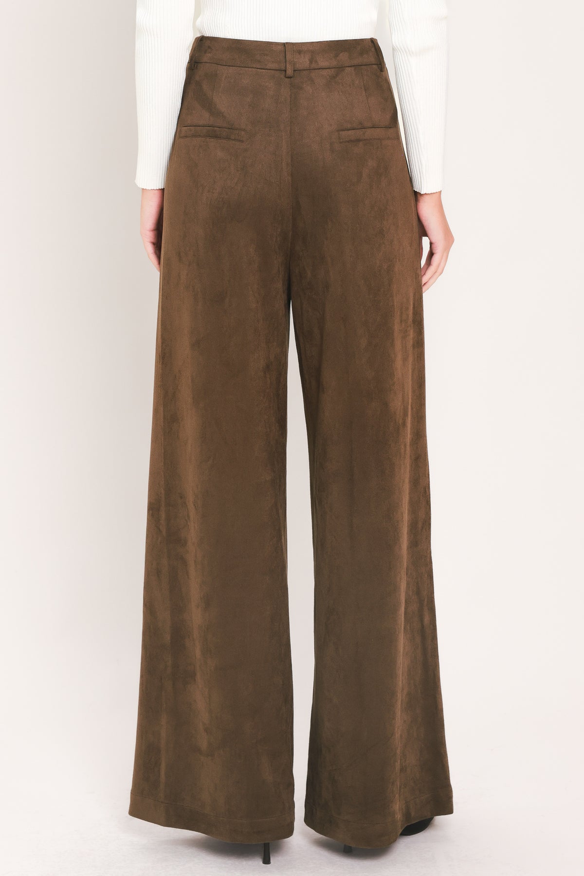 A person wearing high-waisted, wide-leg brown suede pants | Flying Tomato