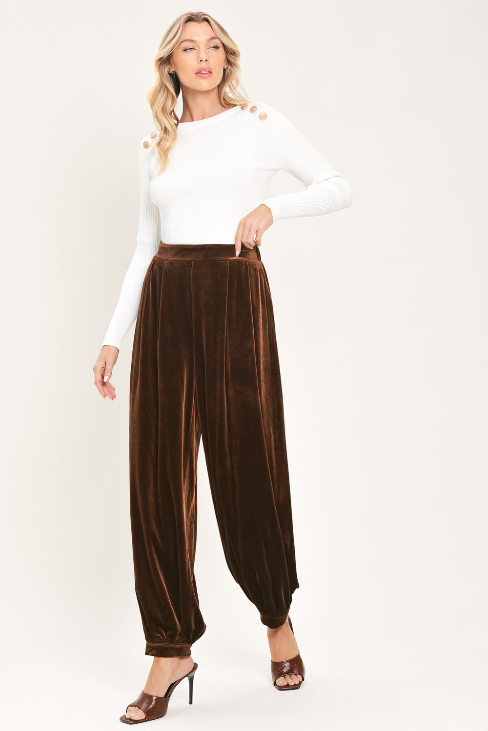 A person wearing high-waisted, loose brown velvet harem-style pants with gathered cuffs | Flying Tomato
