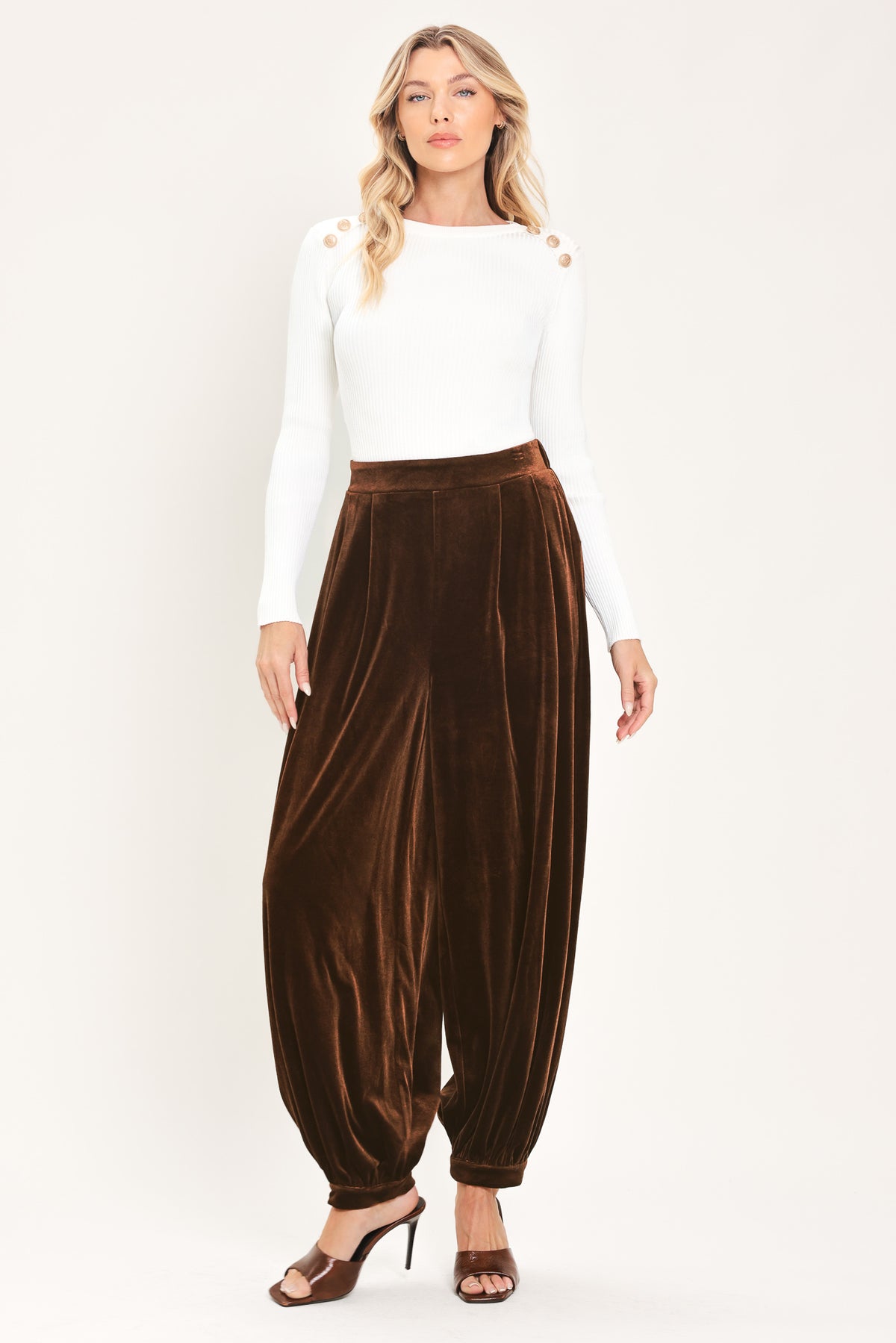 A person wearing high-waisted, loose brown velvet harem-style pants with gathered cuffs | Flying Tomato