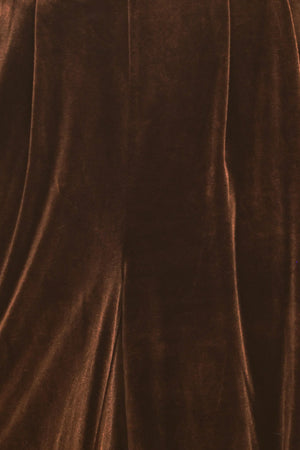A person wearing high-waisted, loose brown velvet harem-style pants with gathered cuffs | Flying Tomato