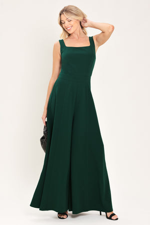 Woman wearing a sleeveless square neck solid hunter green wide-leg jumpsuit | Flying Tomato