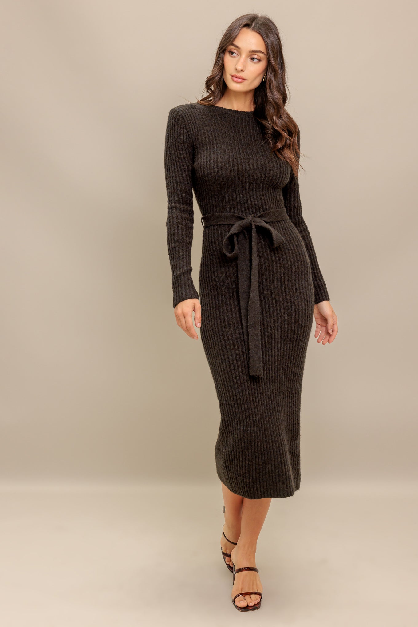 A sweater knit midi with long sleeve and self sash tie
