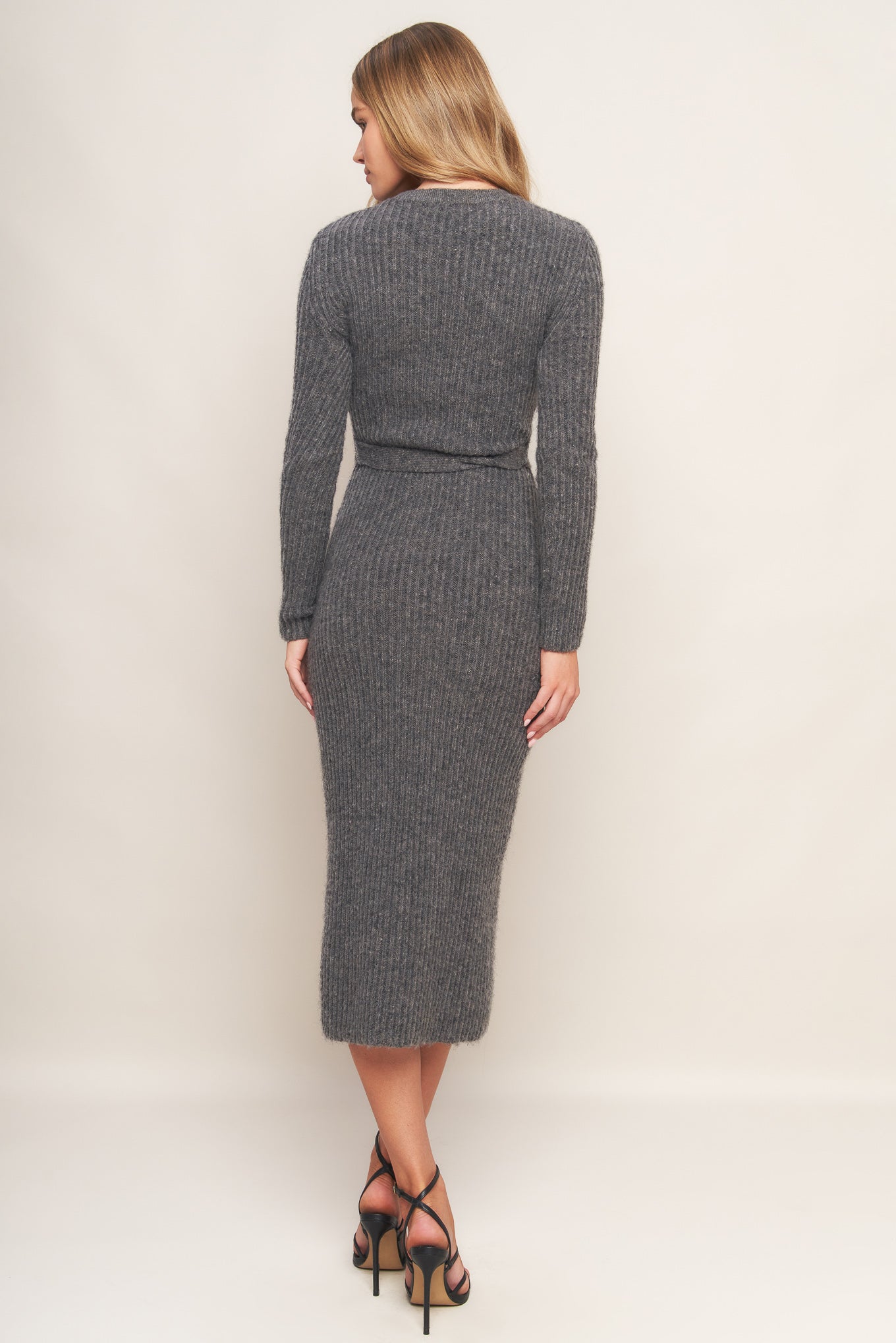 A sweater knit midi with long sleeve and self sash tie