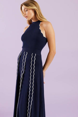 A solid sweater knit midi dress featuring halter neckline and back neck button closure


Details:

Self : 75% Viscose 25% Nylon

Size &amp; Fit

- Model is 5`8" And Wearing Size Small
- Measurements Taken From Size Small
- Approx. Length: 55"
