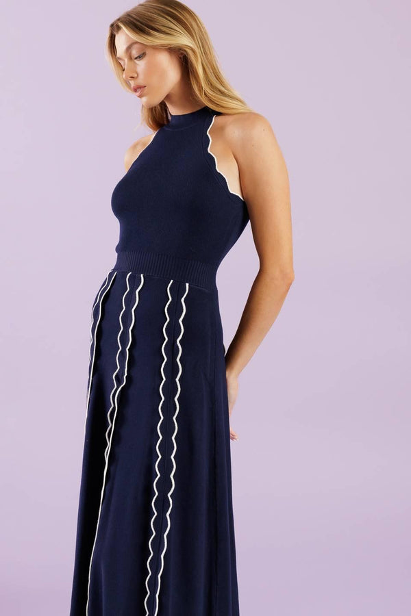 A solid sweater knit midi dress featuring halter neckline and back neck button closure


Details:

Self : 75% Viscose 25% Nylon

Size &amp; Fit

- Model is 5`8" And Wearing Size Small
- Measurements Taken From Size Small
- Approx. Length: 55"