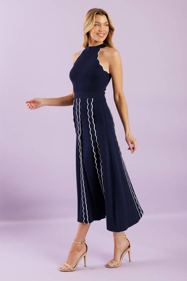A solid sweater knit midi dress featuring halter neckline and back neck button closure


Details:

Self : 75% Viscose 25% Nylon

Size &amp; Fit

- Model is 5`8" And Wearing Size Small
- Measurements Taken From Size Small
- Approx. Length: 55"