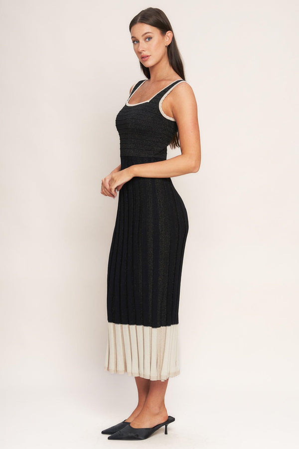 A sweater knit midi dress featuring square neckline, sleeveless and body contouring