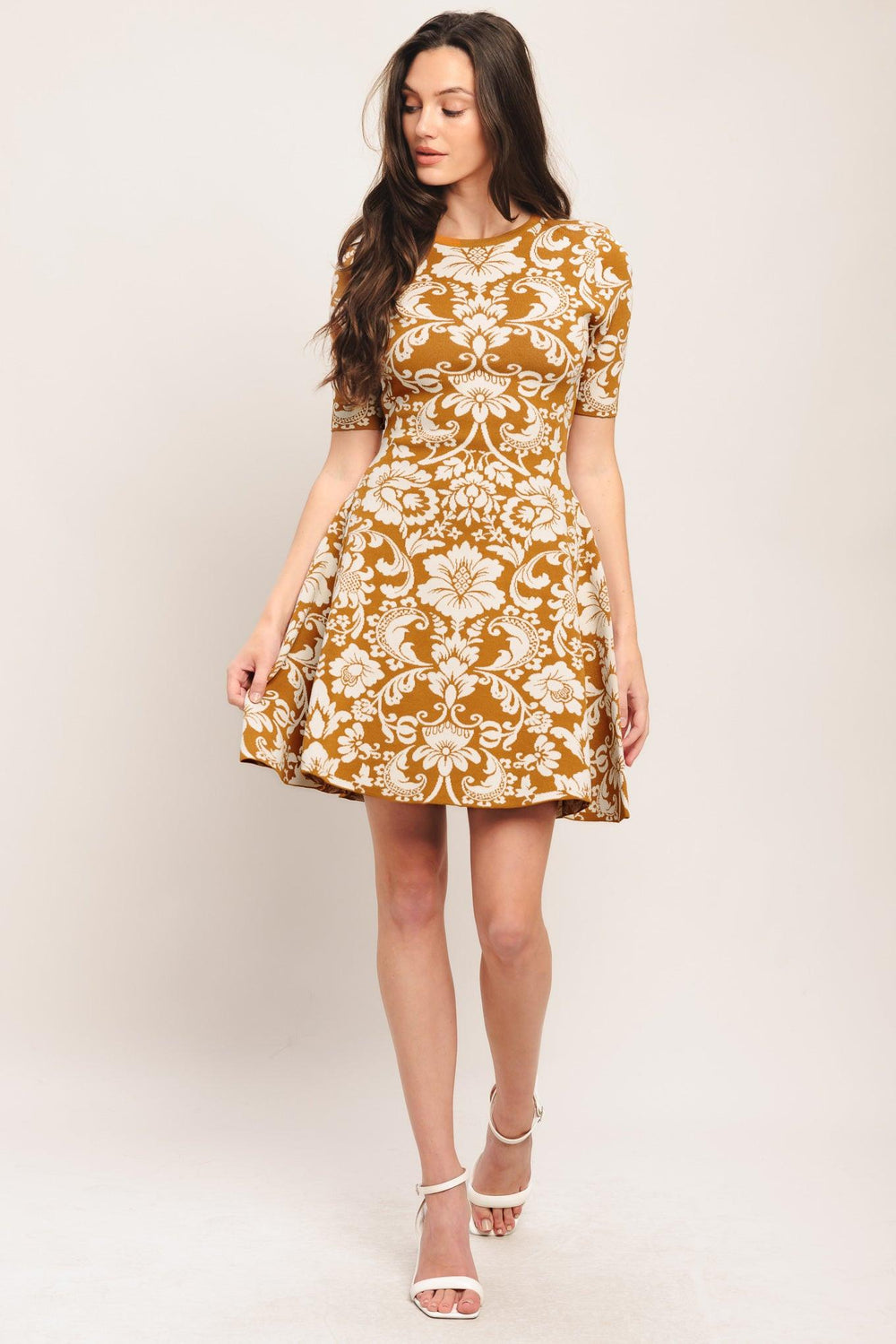 A sweater knit mini dress with round neckline and short sleeve

Details:

Self: 49% Viscose 19% Nylon 32% Polyester

Size & Fit

-Model is 5`8" And Wearing Size Small
-Measurements Taken From Size Small
-Approx. Length: 36"