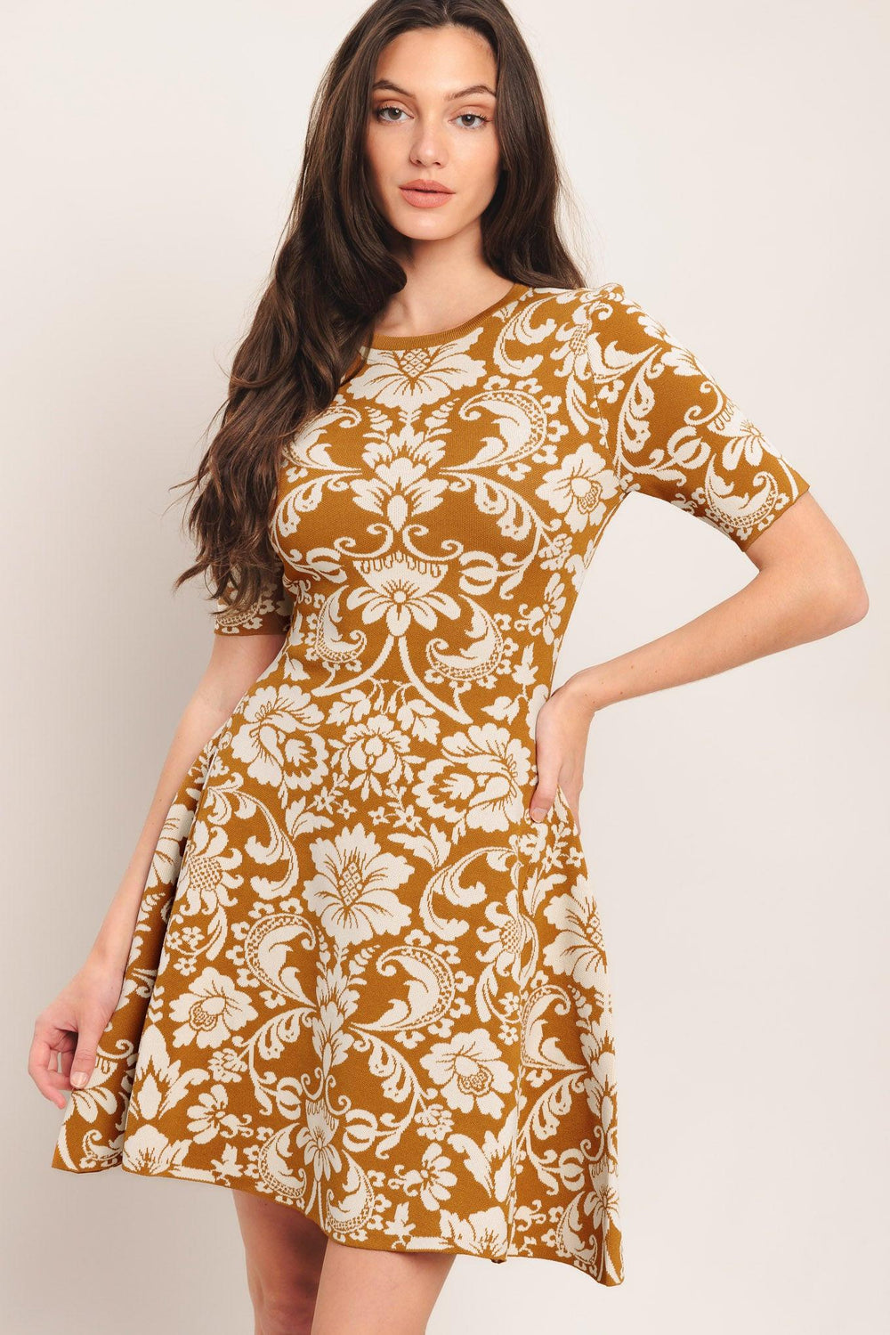 A sweater knit mini dress with round neckline and short sleeve

Details:

Self: 49% Viscose 19% Nylon 32% Polyester

Size & Fit

-Model is 5`8" And Wearing Size Small
-Measurements Taken From Size Small
-Approx. Length: 36"