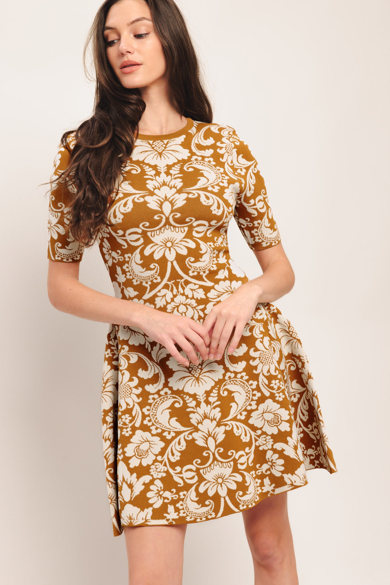 A sweater knit mini dress with round neckline and short sleeve

Details:

Self: 49% Viscose 19% Nylon 32% Polyester

Size & Fit

-Model is 5`8" And Wearing Size Small
-Measurements Taken From Size Small
-Approx. Length: 36"