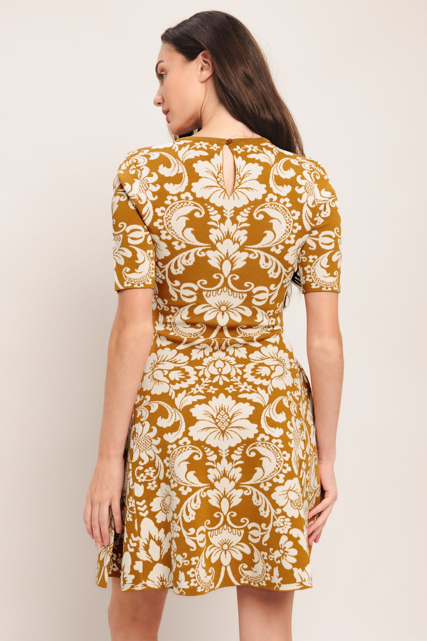 A sweater knit mini dress with round neckline and short sleeve

Details:

Self: 49% Viscose 19% Nylon 32% Polyester

Size & Fit

-Model is 5`8" And Wearing Size Small
-Measurements Taken From Size Small
-Approx. Length: 36"