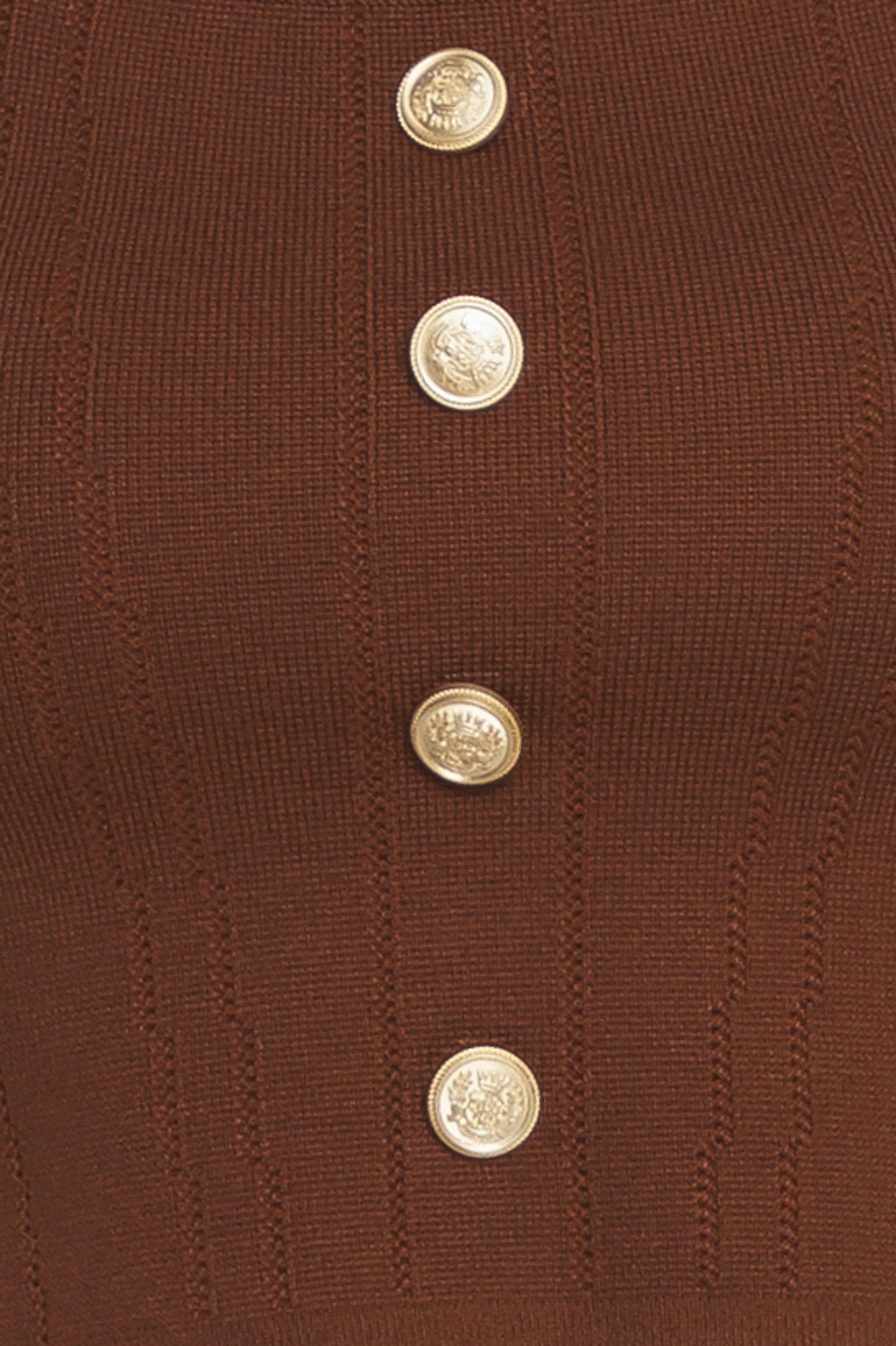 A brown sweater knit top featuring square neckline, cap sleeve and front button detail