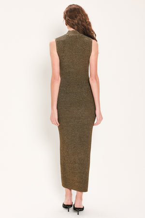 Woman wearing a brown shimmery knitted, sleeveless midi dress with small vertical cut-outs near the chest | Flying Tomato