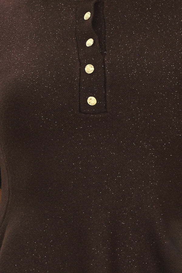 A woman modeling a short-sleeve knit top in dark brown with a buttoned henley neckline and a peplum hem | Flying Tomato