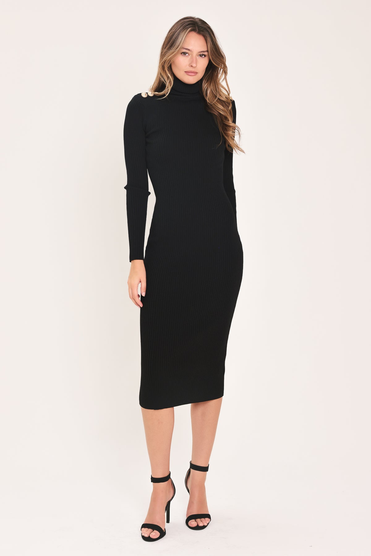 A woman modeling a black long-sleeve mock neck midi dress | Flying Tomato