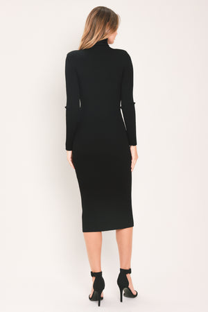 A woman modeling a black long-sleeve mock neck midi dress | Flying Tomato