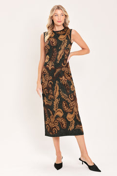 A woman modeling a sleeveless midi dress with a black base and an intricate gold metallic botanical and scroll pattern | Flying Tomato