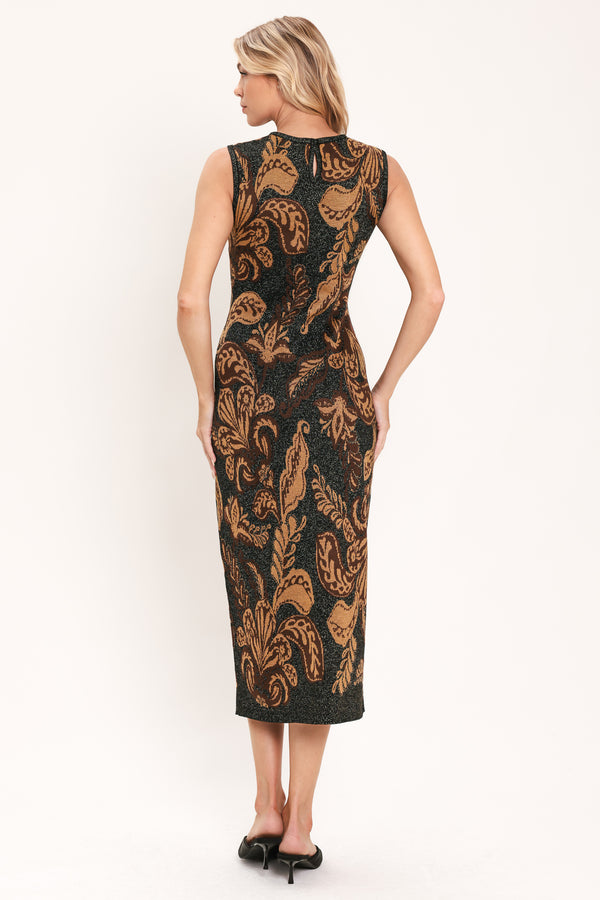 A woman modeling a sleeveless midi dress with a black base and an intricate gold metallic botanical and scroll pattern | Flying Tomato
