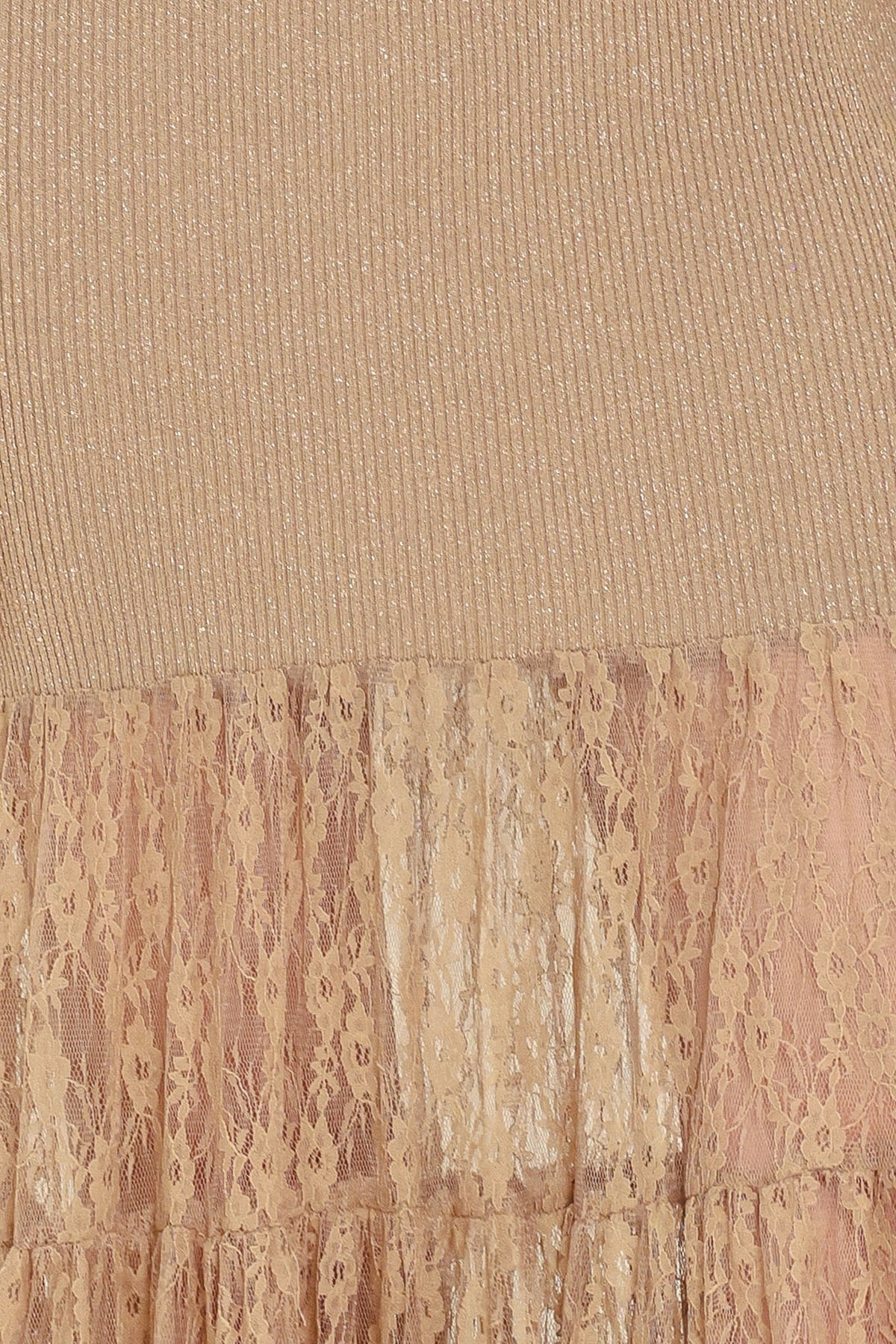 Woman wearing a sleeveless mock neck beige/gold metallic maxi dress with lace tiered skirt starting at the thighs | Flying Tomato