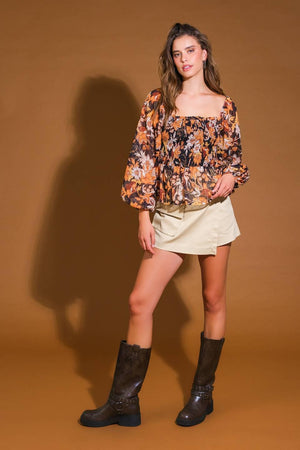BEAMING PERFECTION WOVEN TOP.