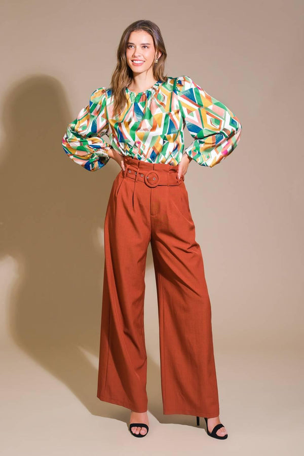 RADIANT POISE WOVEN TOP.