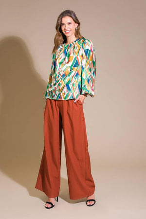 RADIANT POISE WOVEN TOP.