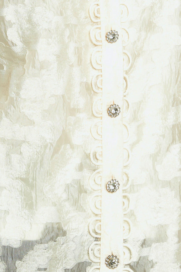 LUMINOUS GLOW WOVEN TOP.