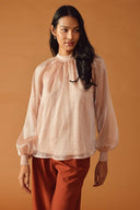 HIGHLY UNPREDICTABLE WOVEN TOP.