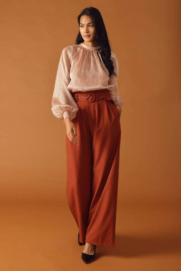 HIGHLY UNPREDICTABLE WOVEN TOP.