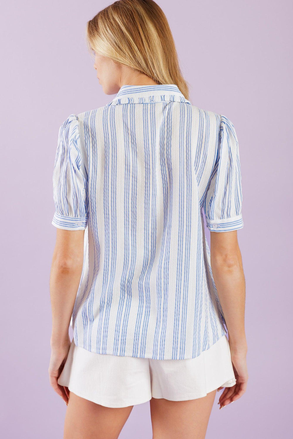 Blue and white striped button up top with lace detail on a white background | Flying Tomato