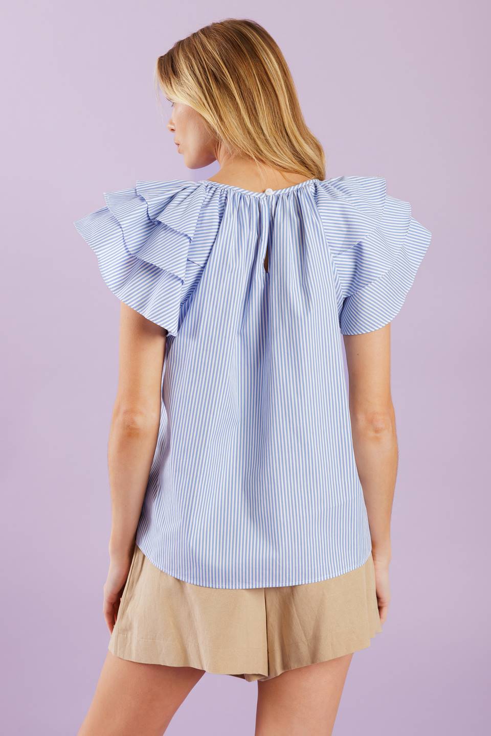 A woven top with stripes, a round neckline, and layered short sleeves, all finished off with a back neck button closure.