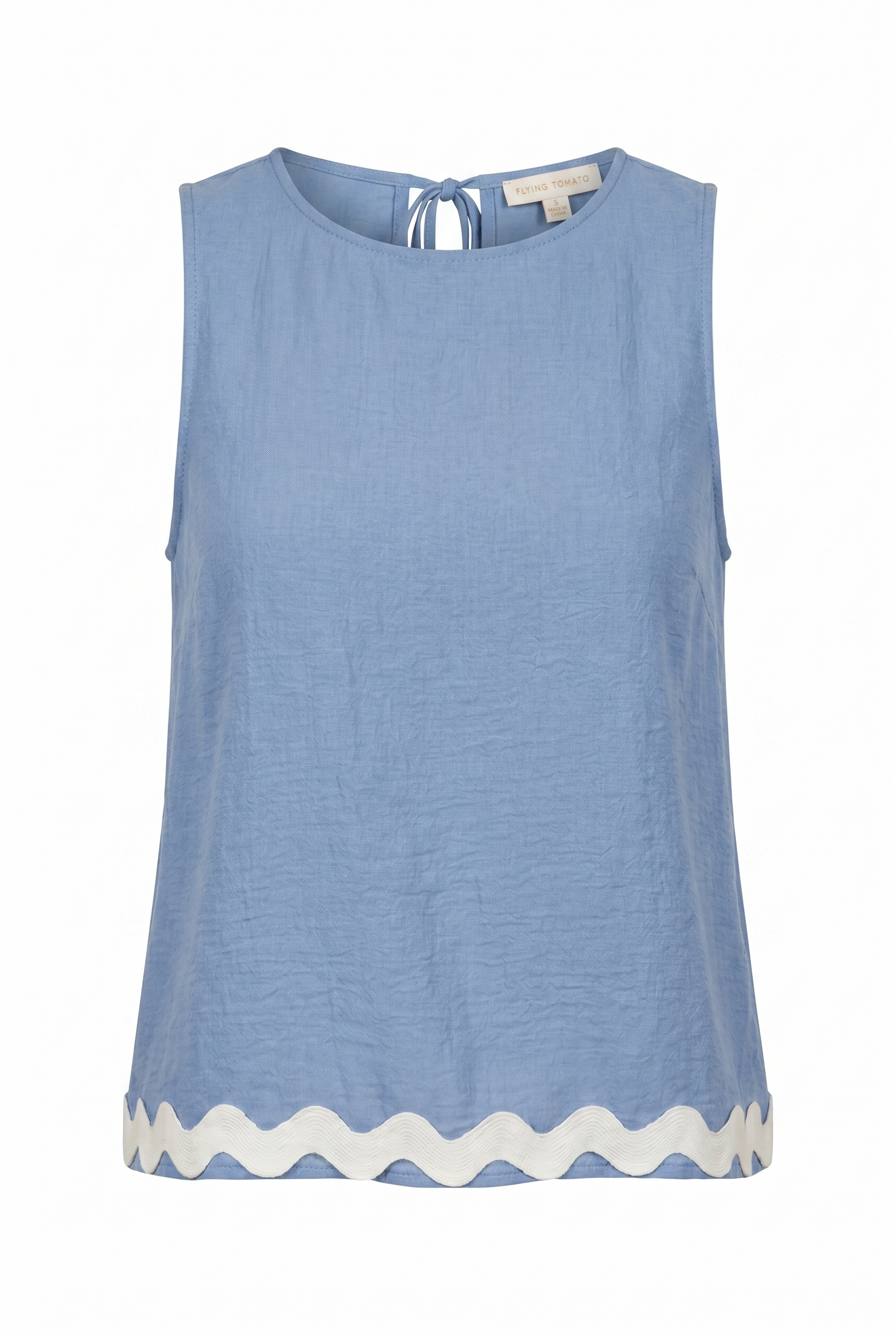 Blue woven top with white ric rac trim on a white background | Flying Tomato