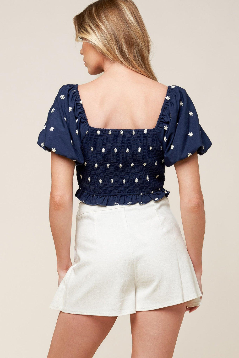 BEBE ALERT NAVY WOVEN TOP.