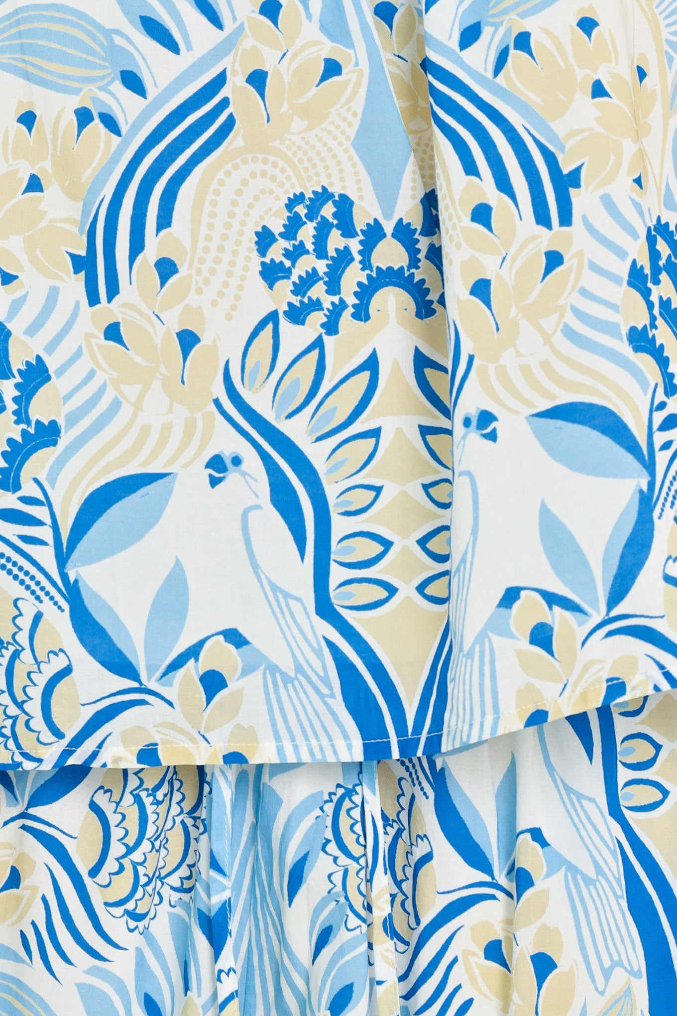 Close up of a blue with yellow printed woven top and short set | Flying Tomato