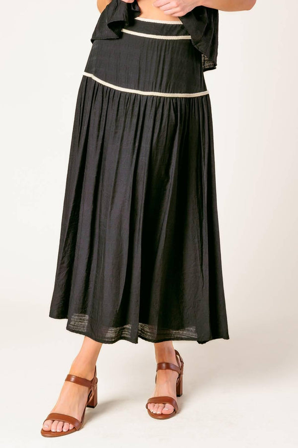 DIVIDE AND CONTOUR WOVEN TOP AND SKIRT SET.