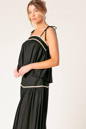 DIVIDE AND CONTOUR WOVEN TOP AND SKIRT SET.