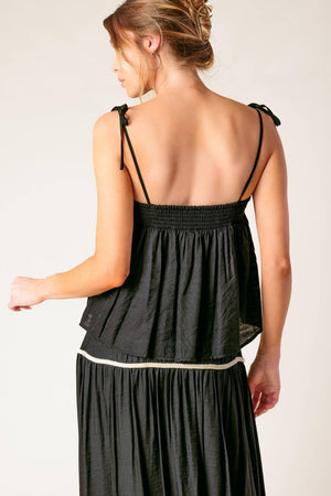 DIVIDE AND CONTOUR WOVEN TOP AND SKIRT SET.