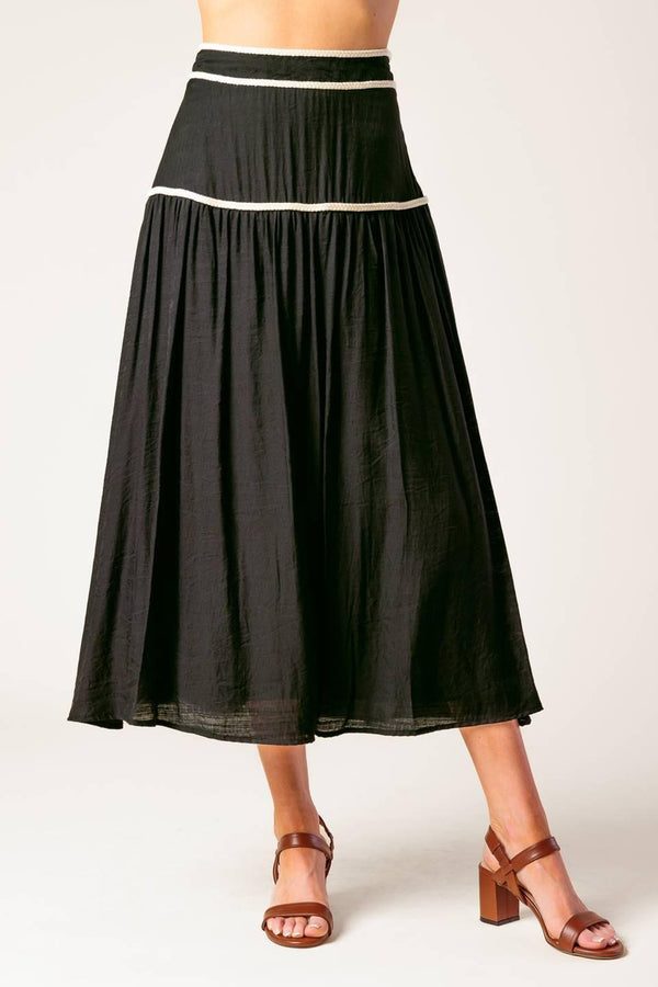 DIVIDE AND CONTOUR WOVEN TOP AND SKIRT SET.