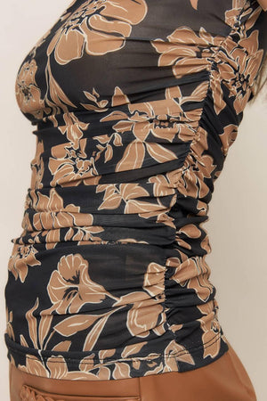 A printed power mesh top with high neckline and long sleeve
