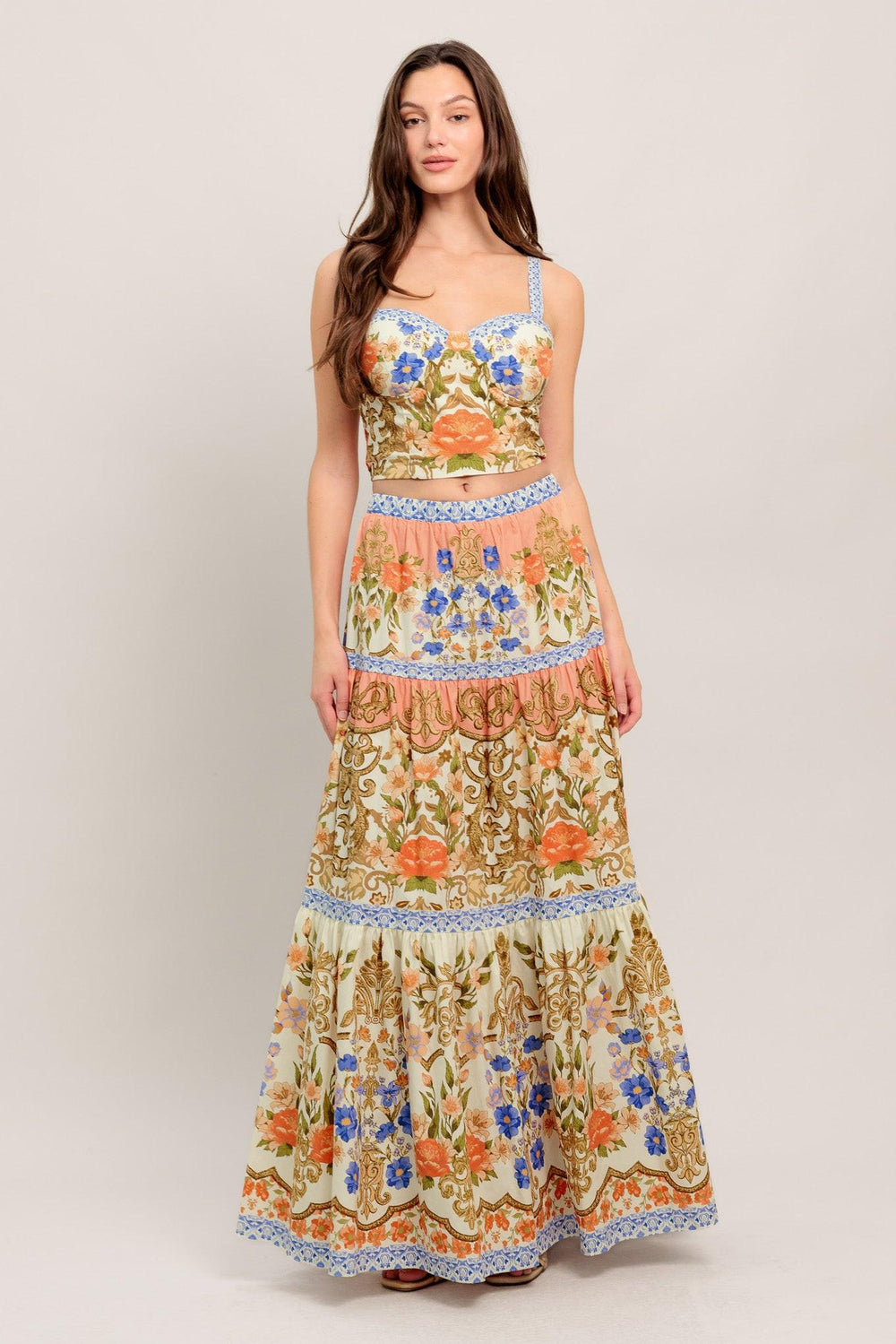 A printed woven bustier top and tiered maxi skirt set

Details:

Self: 100% Cotton
Lining: 100% Polyester

Size & Fit

- Model is 5`8" And Wearing Size Small
- Measurements Taken From Size Small
- Approx. Length: 17" Top
- Approx. Length: 43" Bottom
