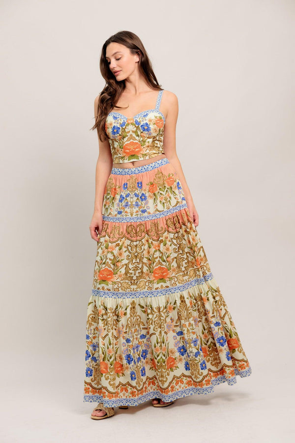 A printed woven bustier top and tiered maxi skirt set

Details:

Self: 100% Cotton
Lining: 100% Polyester

Size & Fit

- Model is 5`8" And Wearing Size Small
- Measurements Taken From Size Small
- Approx. Length: 17" Top
- Approx. Length: 43" Bottom