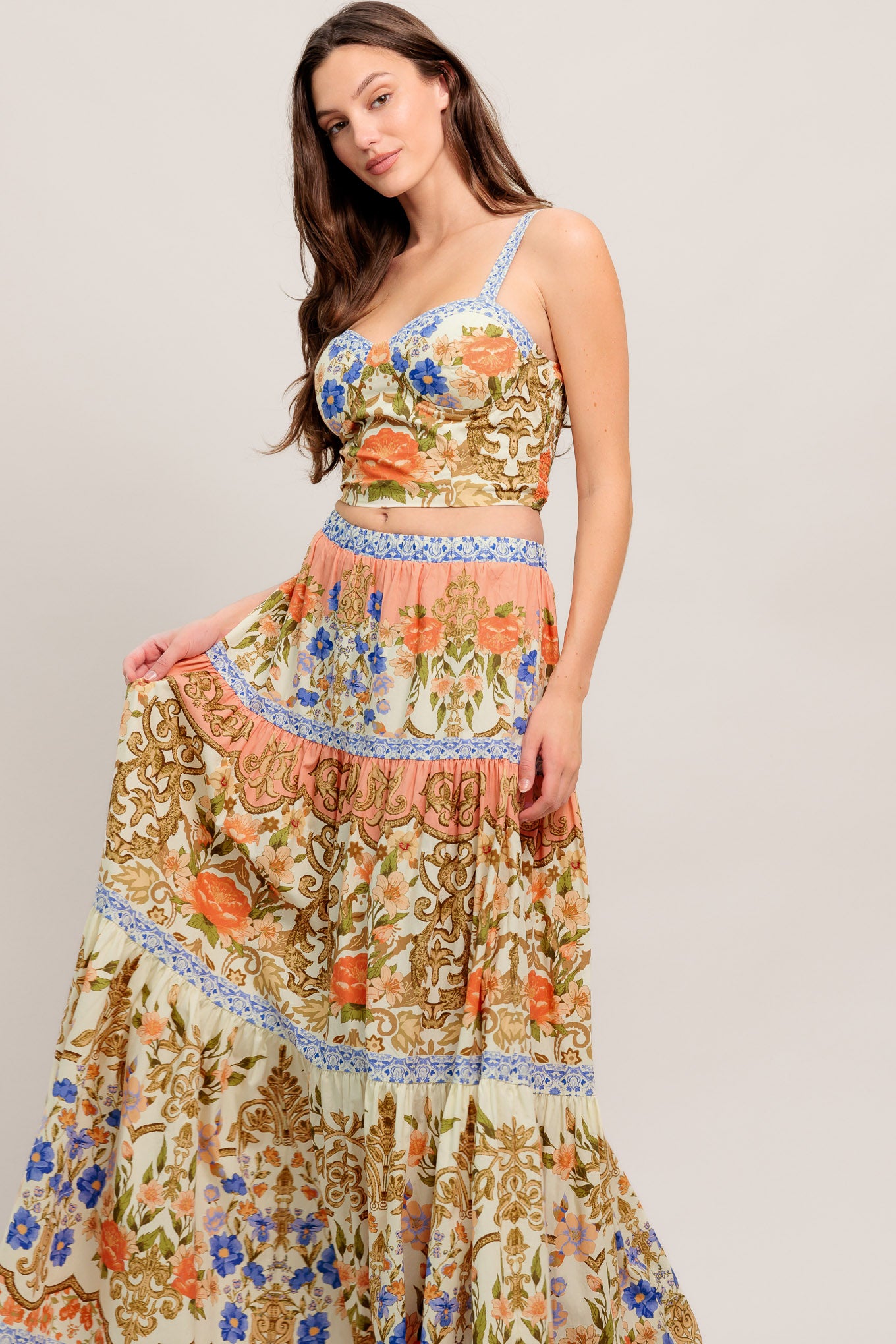 A printed woven bustier top and tiered maxi skirt set

Details:

Self: 100% Cotton
Lining: 100% Polyester

Size & Fit

- Model is 5`8" And Wearing Size Small
- Measurements Taken From Size Small
- Approx. Length: 17" Top
- Approx. Length: 43" Bottom