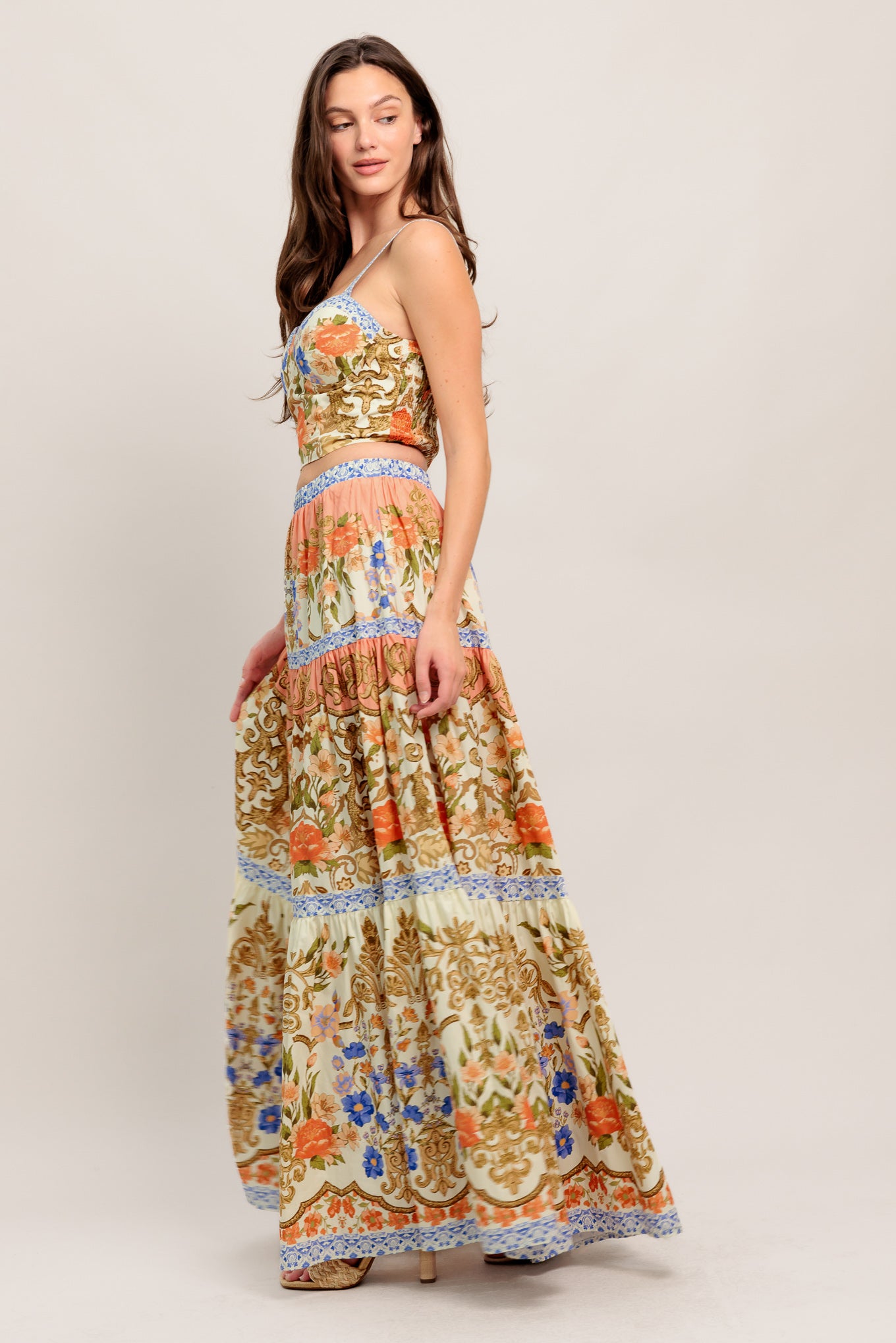 A printed woven bustier top and tiered maxi skirt set

Details:

Self: 100% Cotton
Lining: 100% Polyester

Size & Fit

- Model is 5`8" And Wearing Size Small
- Measurements Taken From Size Small
- Approx. Length: 17" Top
- Approx. Length: 43" Bottom