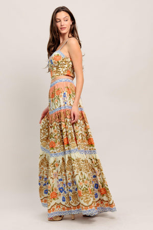 A printed woven bustier top and tiered maxi skirt set

Details:

Self: 100% Cotton
Lining: 100% Polyester

Size & Fit

- Model is 5`8" And Wearing Size Small
- Measurements Taken From Size Small
- Approx. Length: 17" Top
- Approx. Length: 43" Bottom