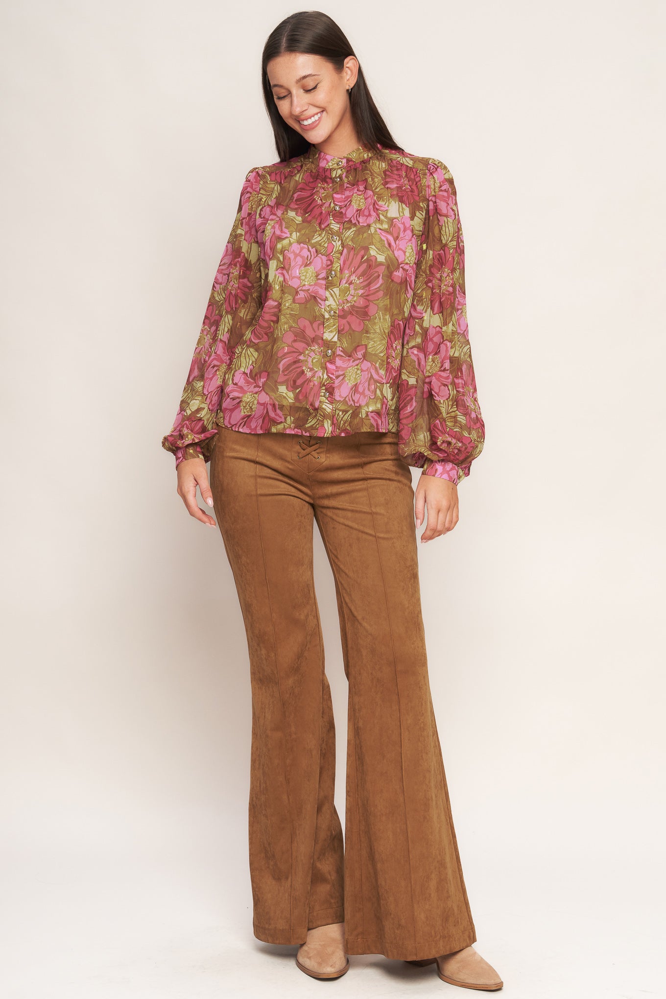 A printed woven top featuring china collar, long sleeve, front button down